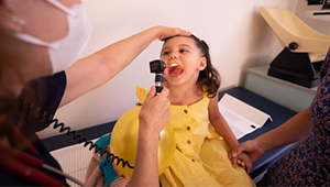 A Physician Examining Her Patient